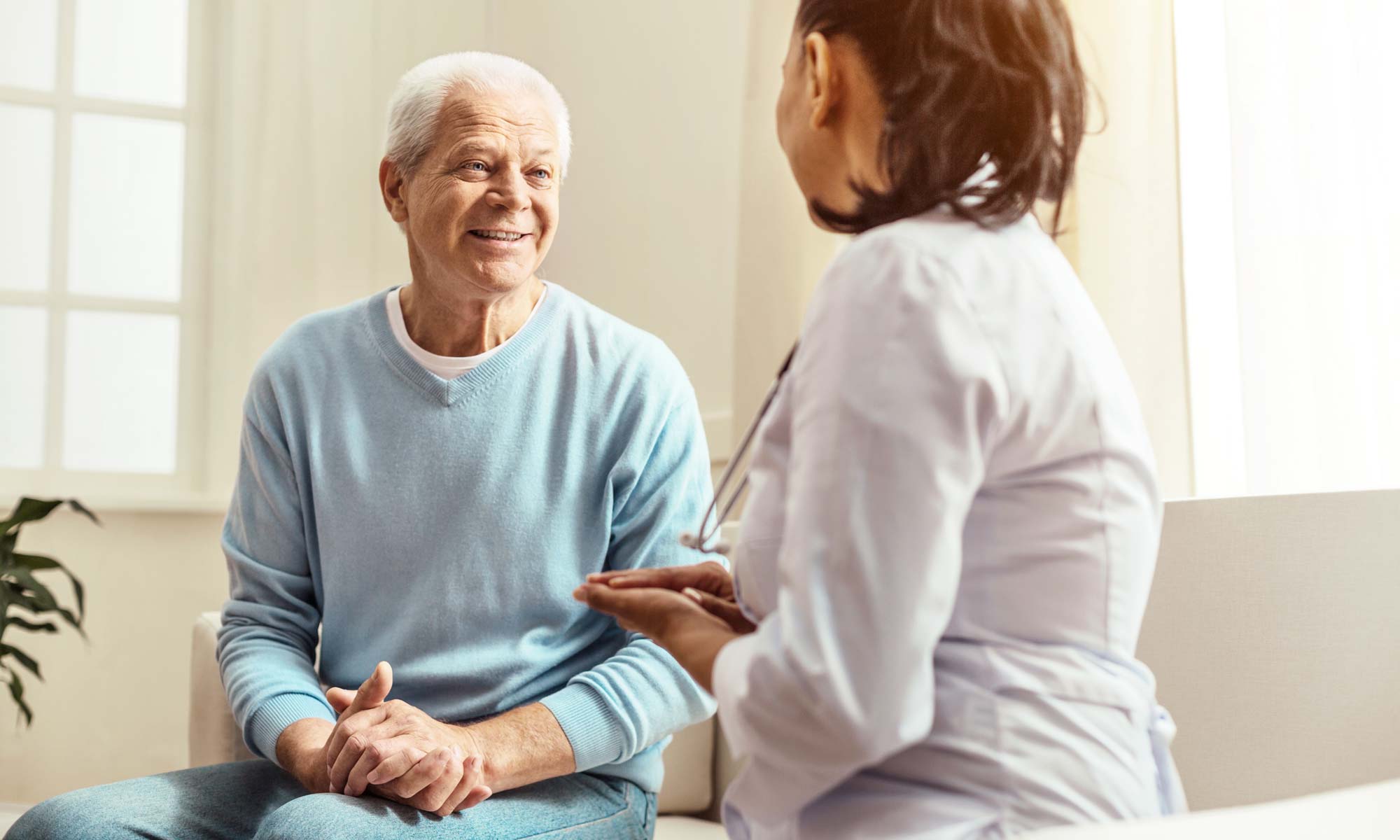 Patient talking with medical practitioner